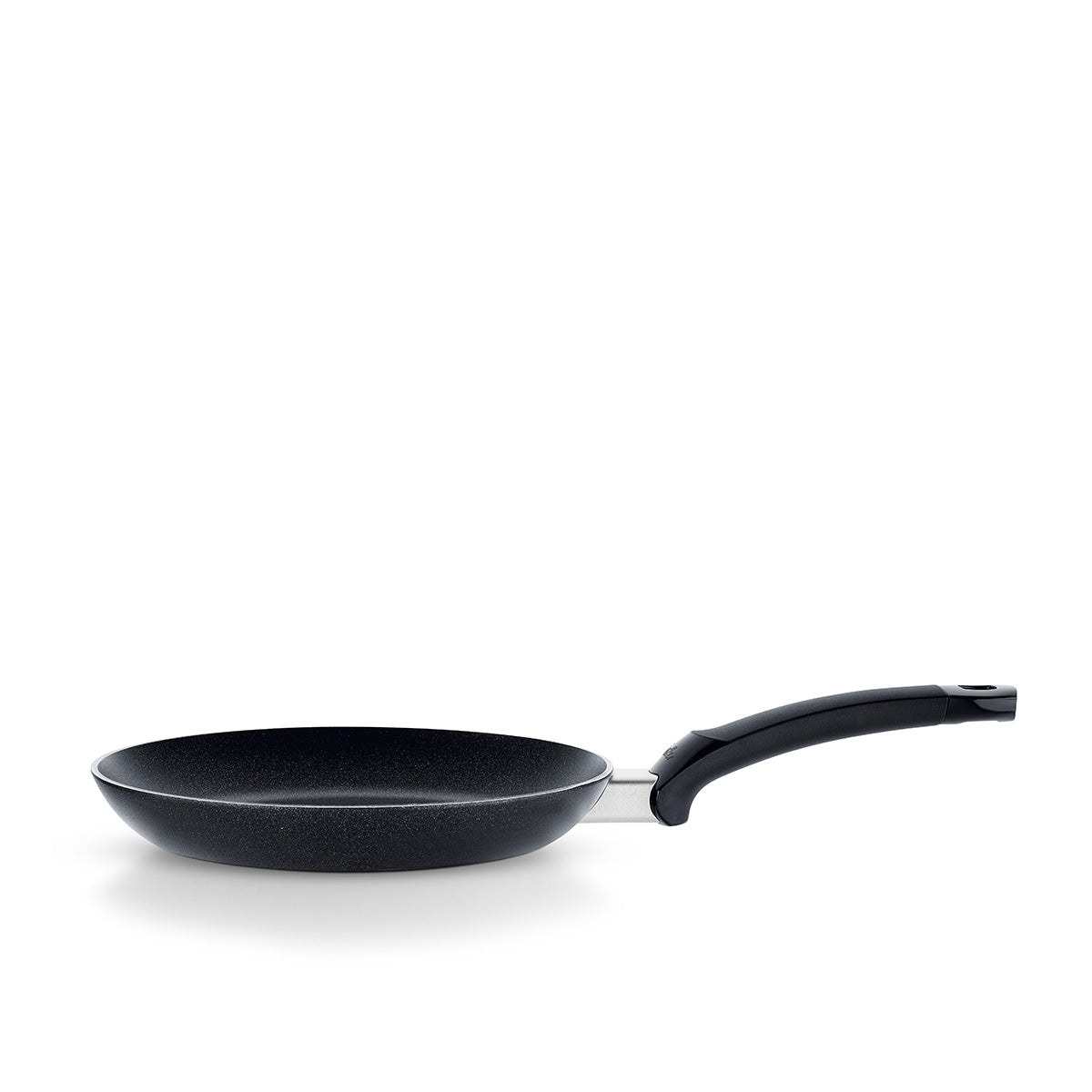 The Fissler Levital®+ shallow pan in elegant black showcases German precision and timeless design against a white background.