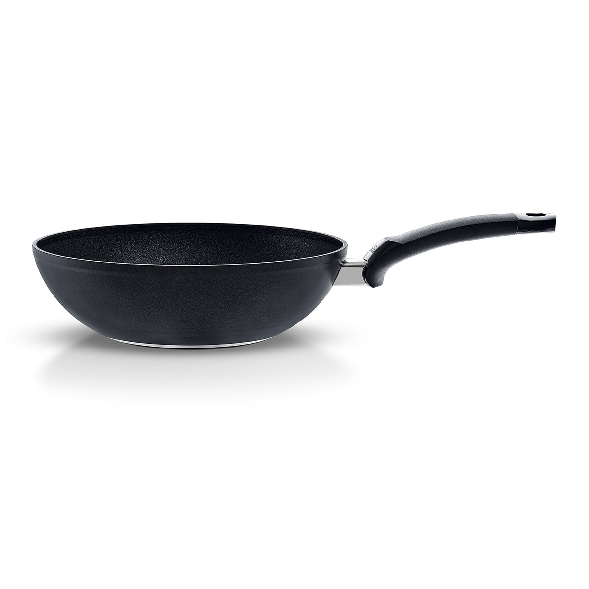Fissler Adamant® Wok with durable non-stick coating, curved handle, and timeless black design stands out against a white background.