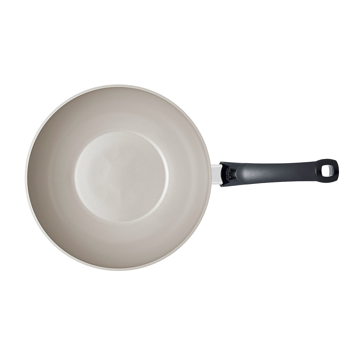 Top view of the Fissler Ceratal® wok pan, beige ceramic coating, PTFE-free, black handle - timeless German engineering on white.
